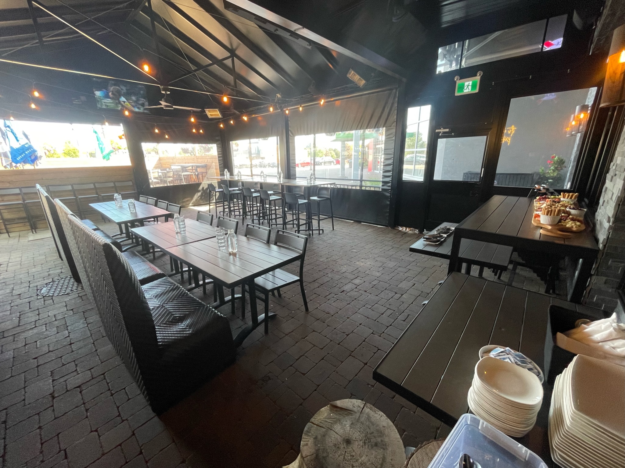 Covered canopy seating open all year at The Oakville Pump & Patio